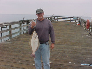 My first (and only) legal halibut during the  2002 season. Halibut, for me, are an incedental catch as I don't target them. I consider each one I catch as a gift from the FishGods.